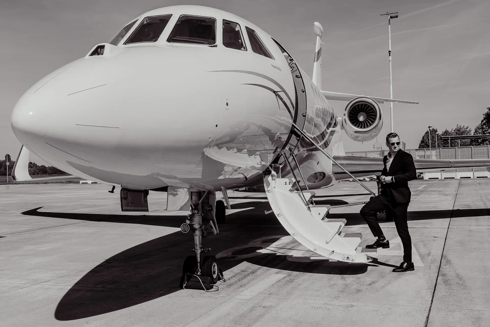 SwiftWings client boarding private jet with assistance from dedicated crew